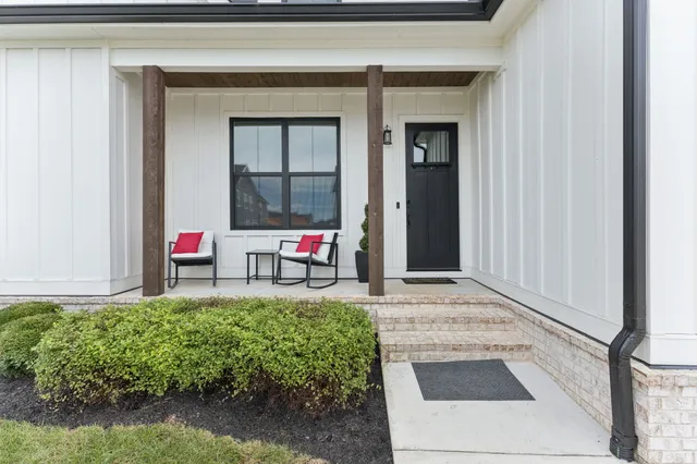 a hallway with wooden floor