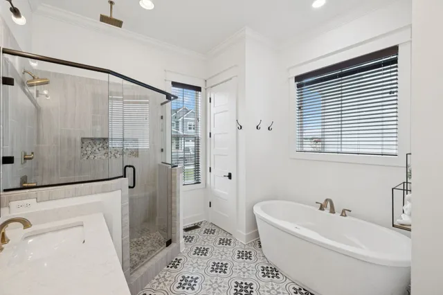 a view of a room with gym equipment on wooden floor and window