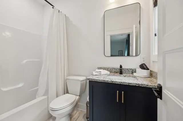a wooden bench sitting in the middle of a lake