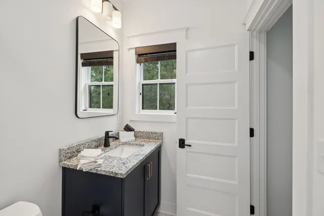 an aerial view of house with yard swimming pool and outdoor seating