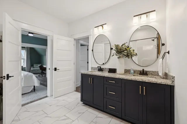 aerial view of a house with a yard and a large pool