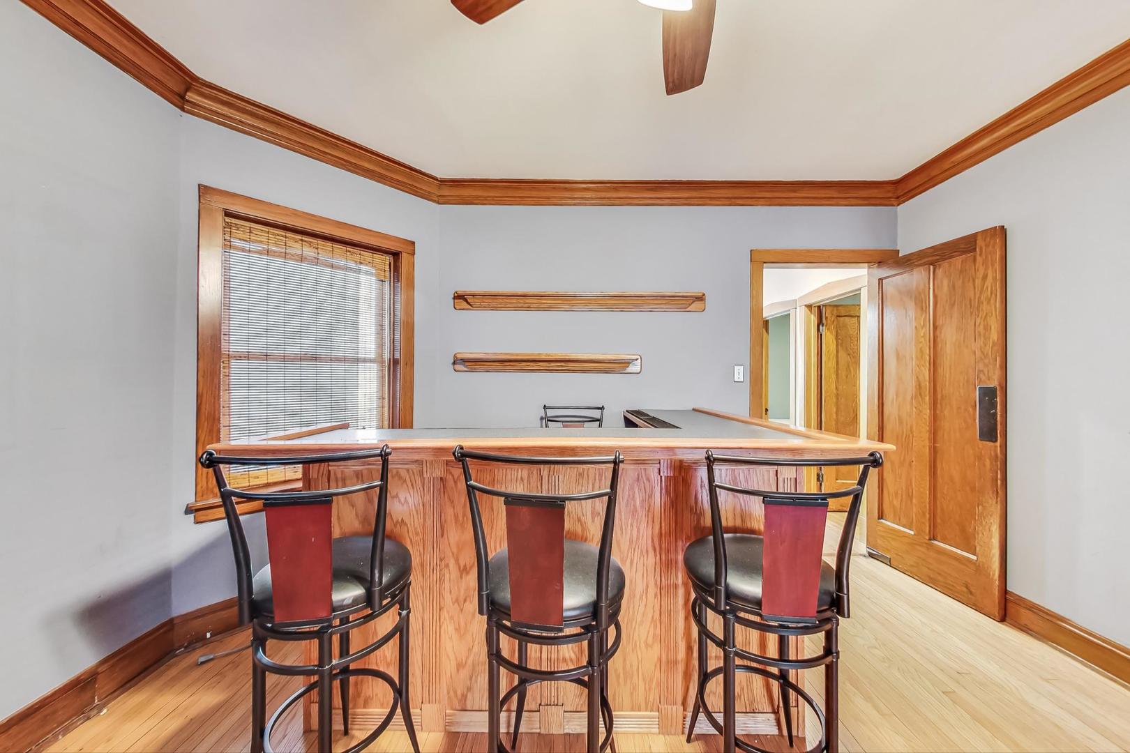 3929 North Drake Avenue Chicago, IL 60618 - Photo 13 of 60 a dining room with furniture and window