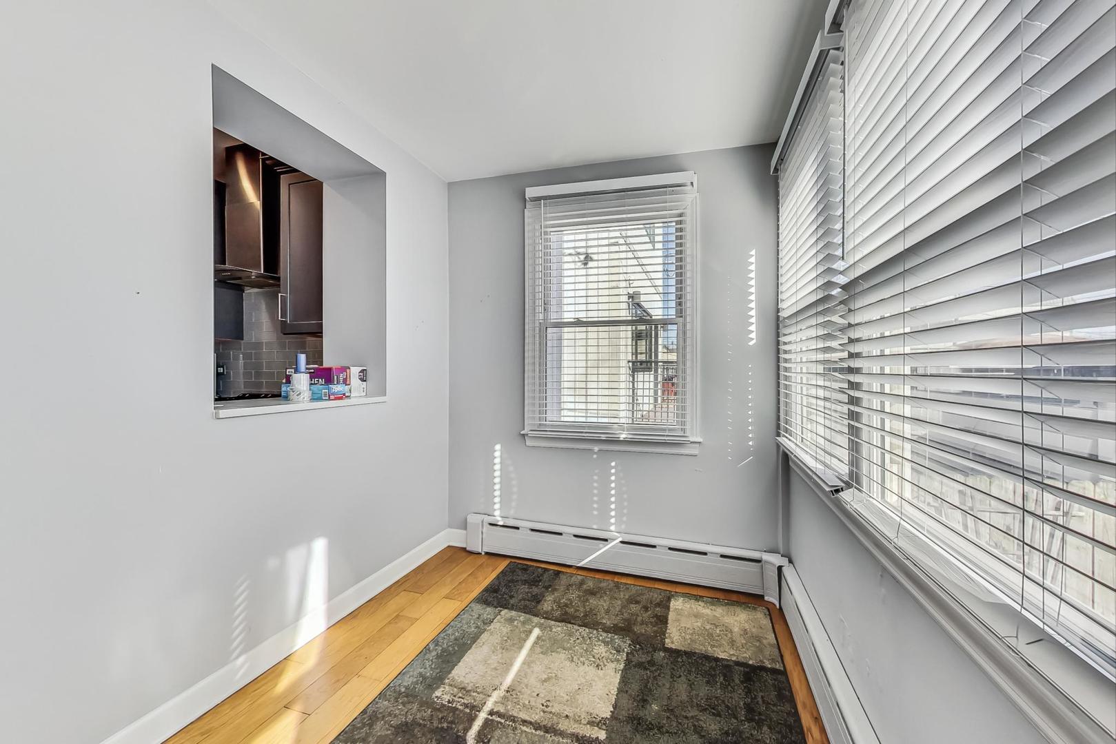 3929 North Drake Avenue Chicago, IL 60618 - Photo 25 of 60 a view of an empty room and window
