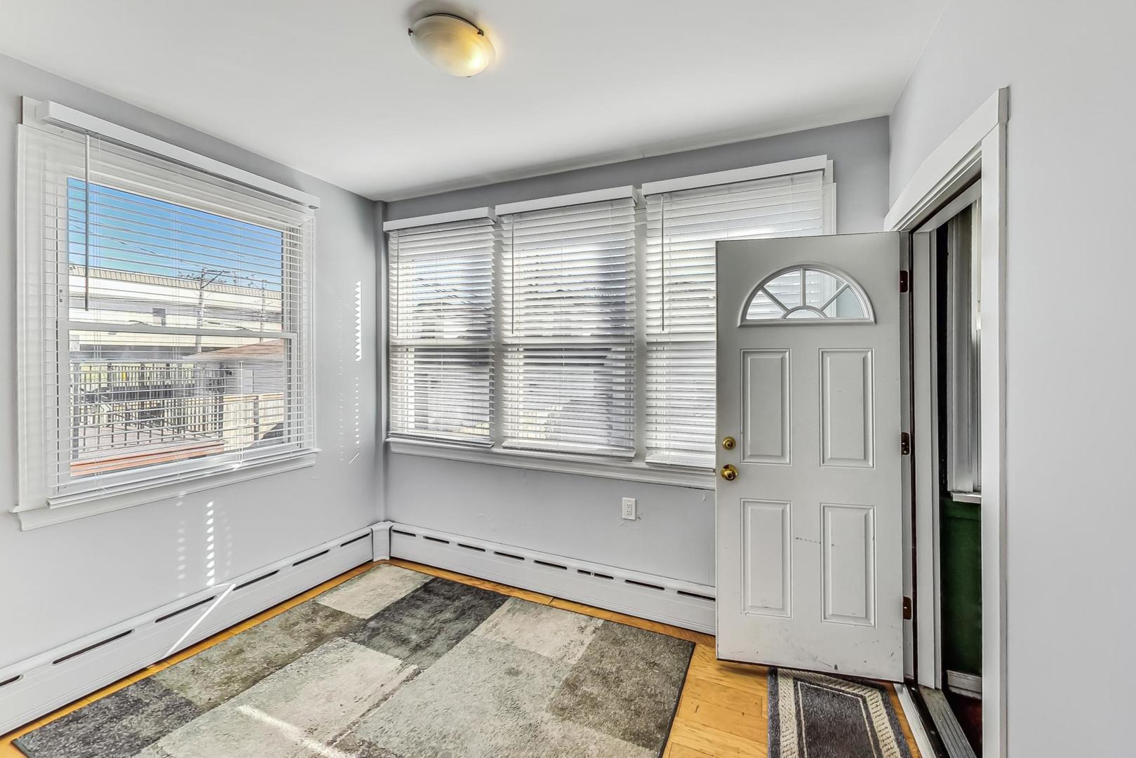 3929 North Drake Avenue Chicago, IL 60618 - Photo 26 of 60 a view of a livingroom with a window