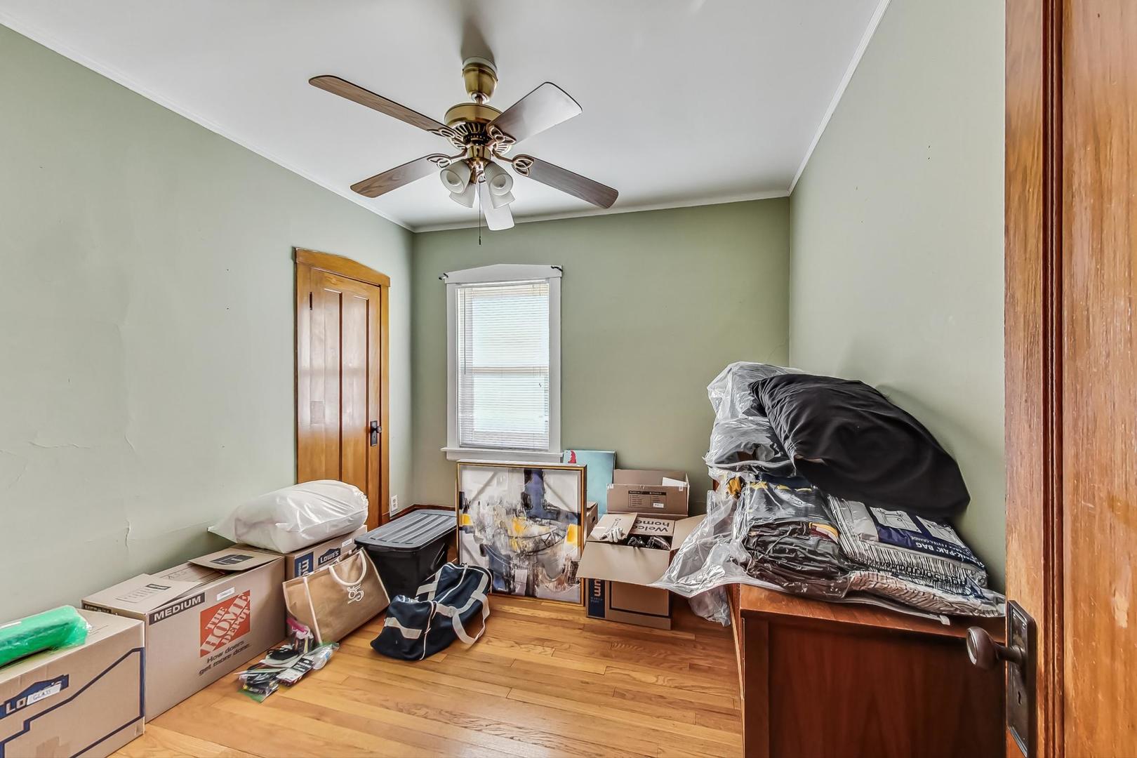 3929 North Drake Avenue Chicago, IL 60618 - Photo 39 of 60 a view of a workspace with furniture and a window