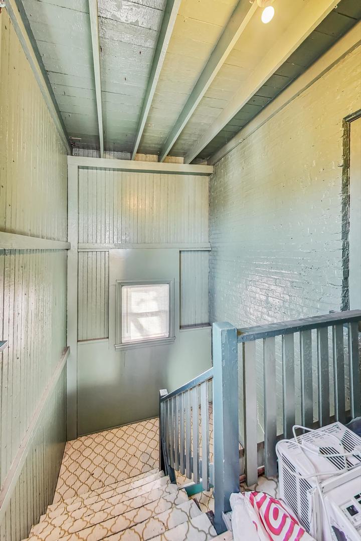 3929 North Drake Avenue Chicago, IL 60618 - Photo 45 of 60 a bedroom with a bed and wooden floor