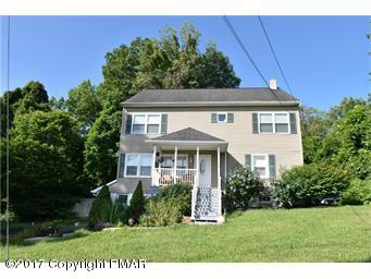 606 School Road Nazareth, PA 18064 - Photo 1 of 23 a front view of a house with a yard