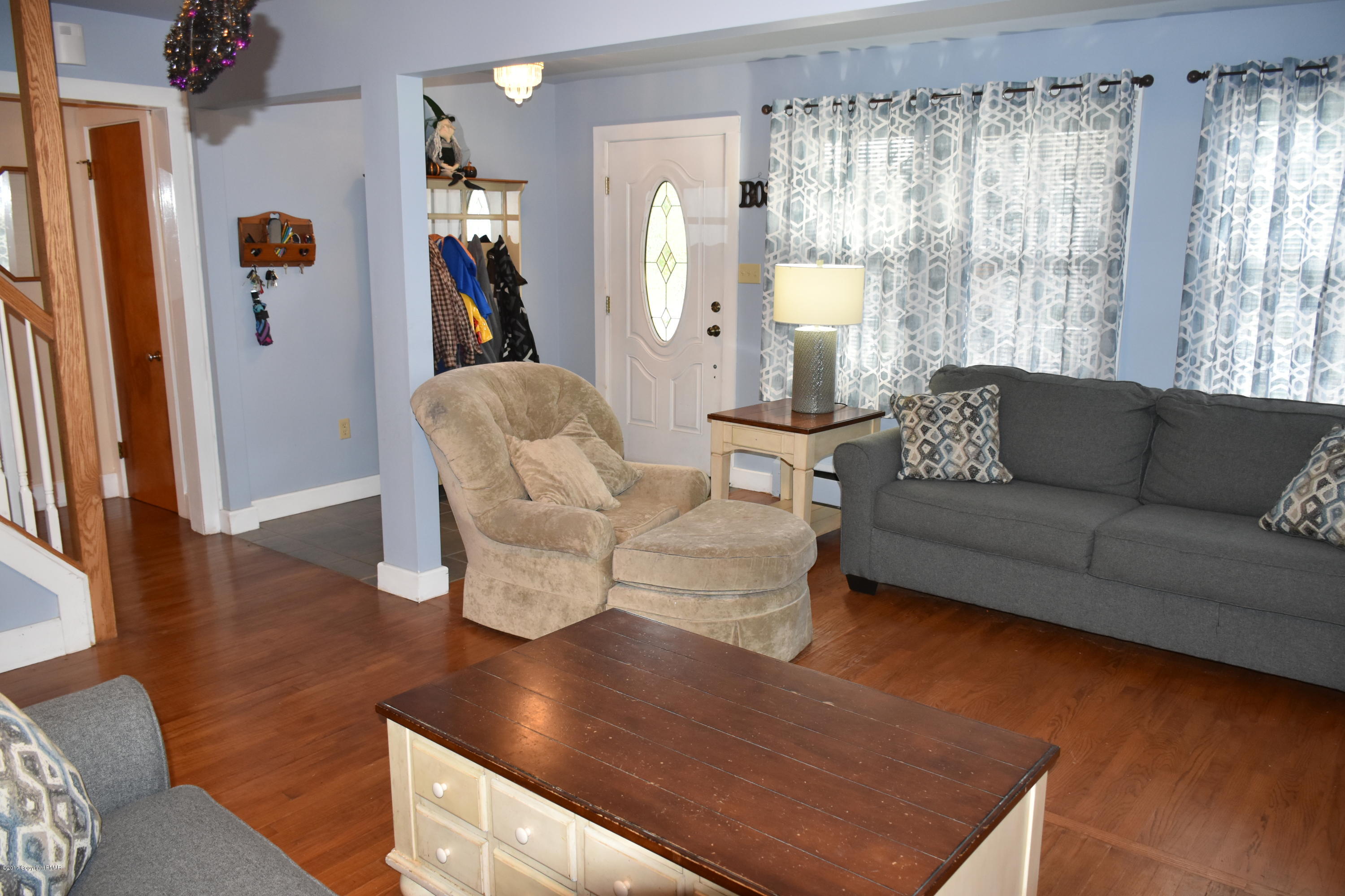 606 School Road Nazareth, PA 18064 - Photo 9 of 23 a living room with furniture and a large window