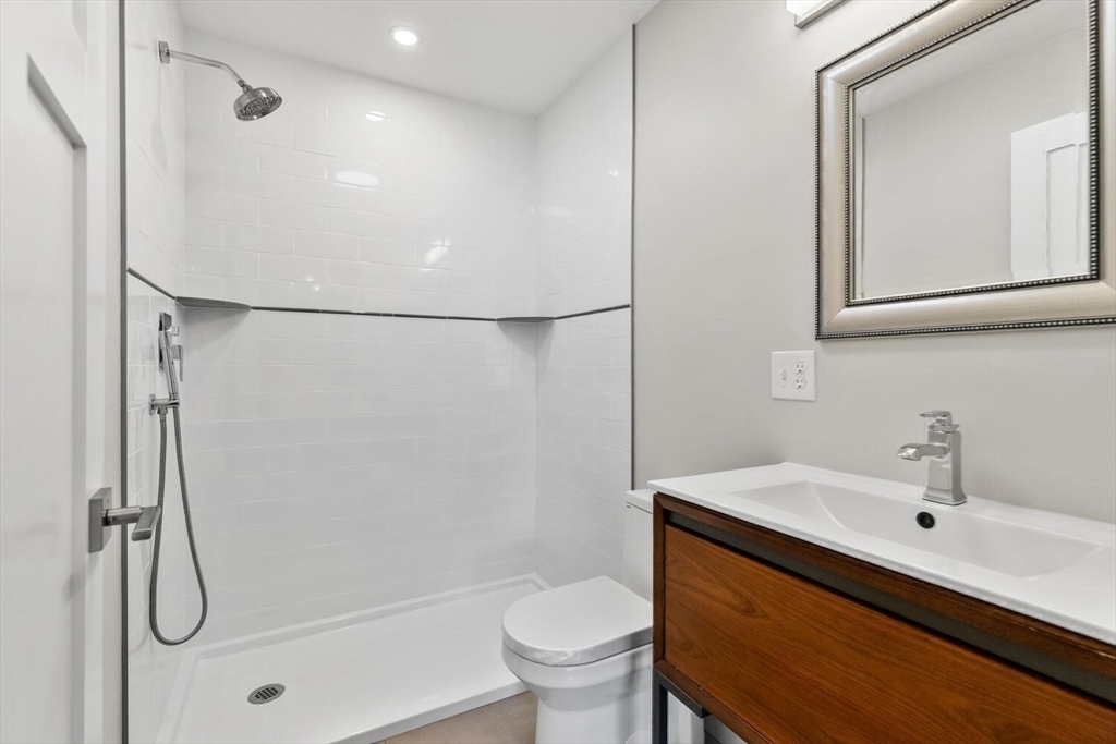 17 Emerson Street Stoneham, MA 02180 - Photo 22 of 41 a bathroom with a sink toilet and shower