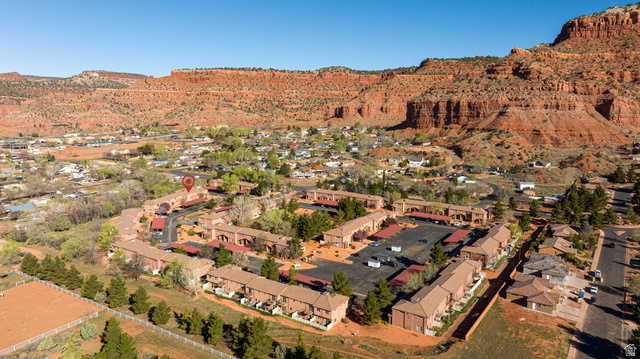 6 300th Road North, Unit I6 Kanab, UT 84741 - Photo 6 of 37 Aerial perspective of suburban area featuring a mountainous background