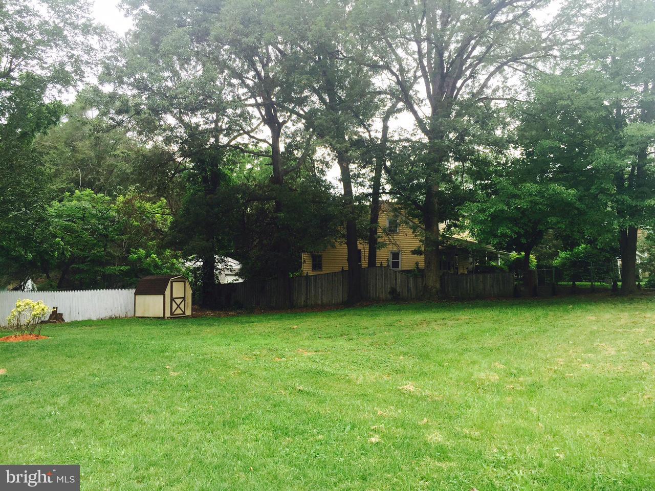 8201 Allentown Road Fort Washington, MD 20744 - Photo 23 of 24 a view of a backyard with a small house