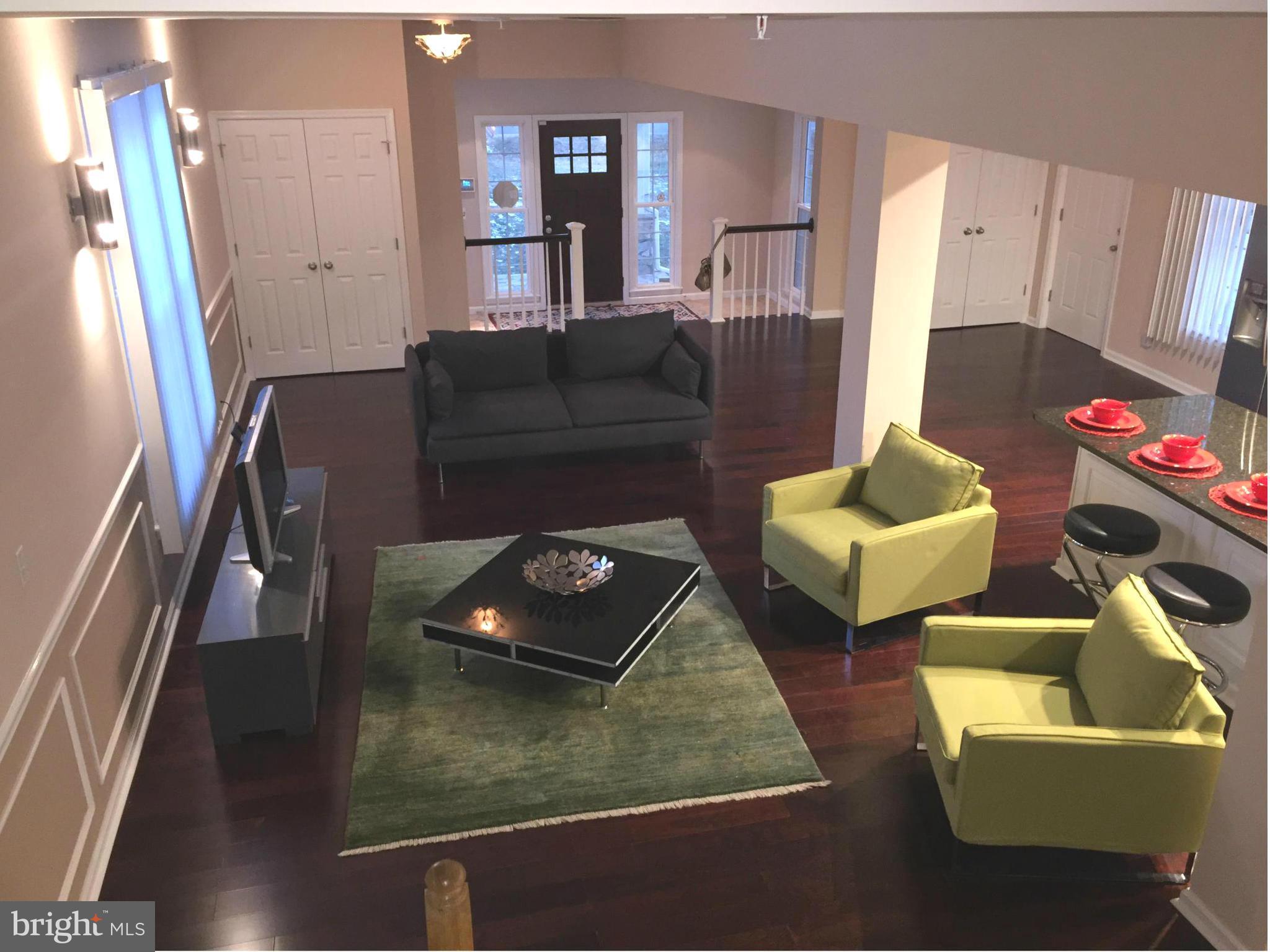 8201 Allentown Road Fort Washington, MD 20744 - Photo 4 of 24 a living room with furniture and a couch