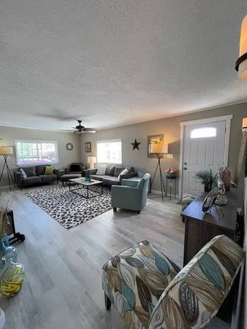 a living room with furniture and a couch