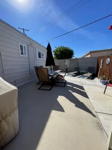 a view of a terrace with chairs