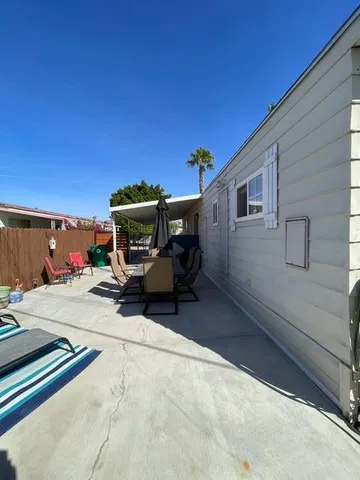 a view of a terrace with chairs