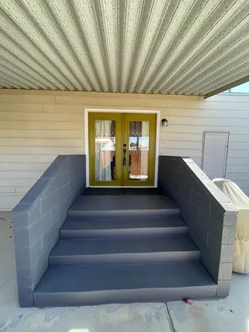 a view of entryway with a front door