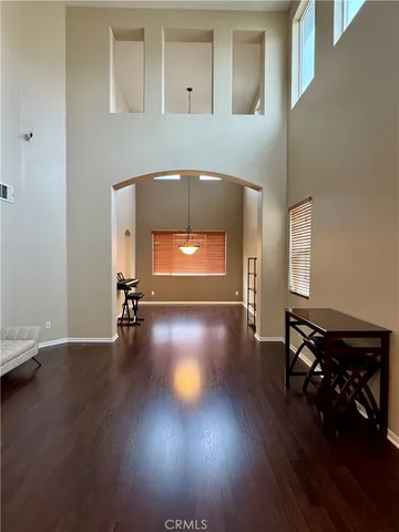 a view of a livingroom with wooden floor