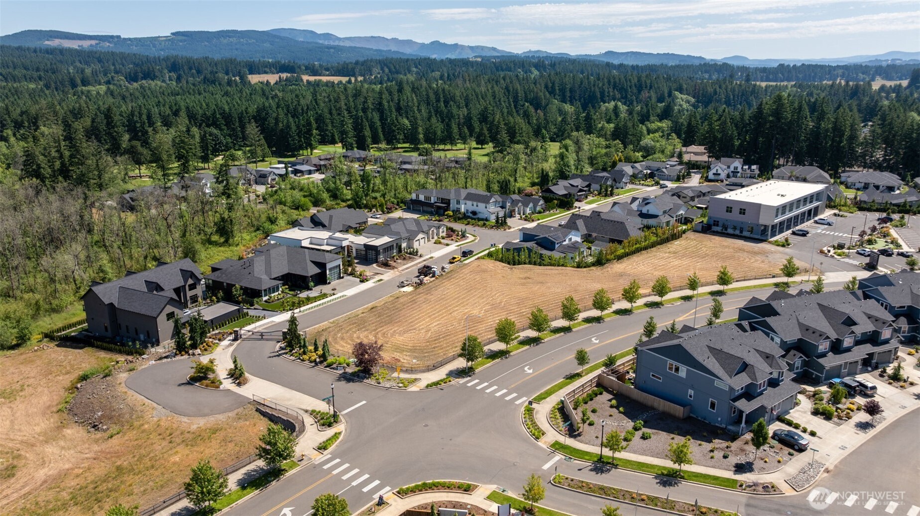 0 Northwest Parkland Camas, WA 98607 - Photo 7 of 21 a view of a house with a garden and a mountain
