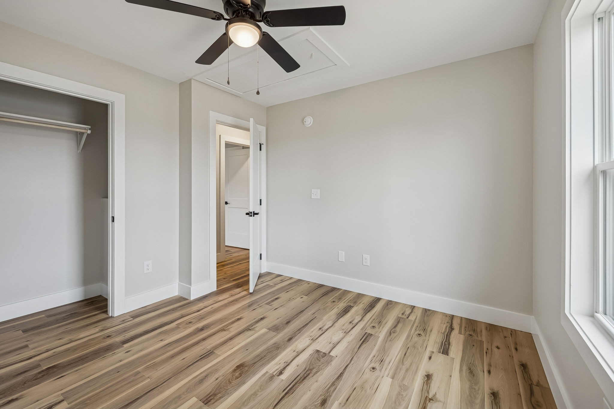 108 Read Avenue Carthage, TN 37030 - Photo 14 of 21 a view of empty room with wooden floor and fan
