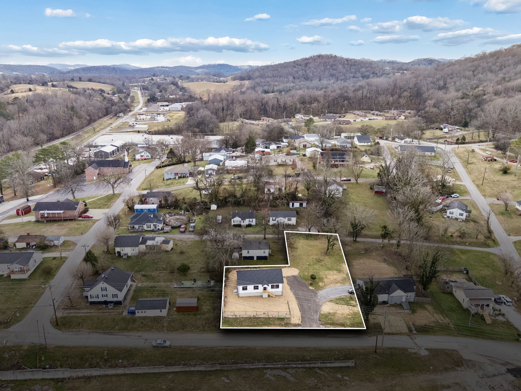 108 Read Avenue Carthage, TN 37030 - Photo 21 of 21 an aerial view of residential houses with parking
