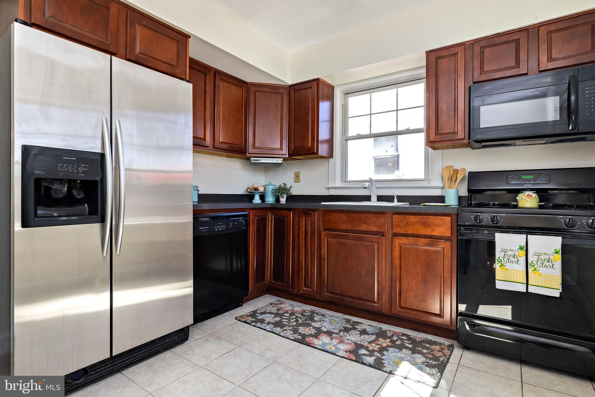 1944 Narberth Avenue Haddon Heights, NJ 08035 - Photo 17 of 61 a kitchen with stainless steel appliances granite countertop a refrigerator and a sink