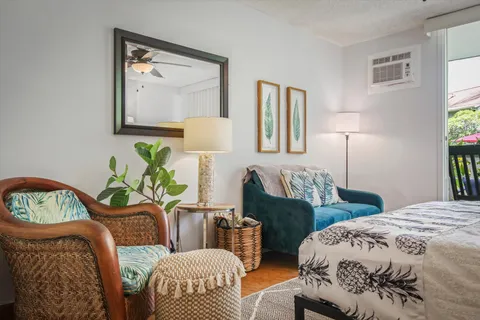 a bedroom with two beds and a table