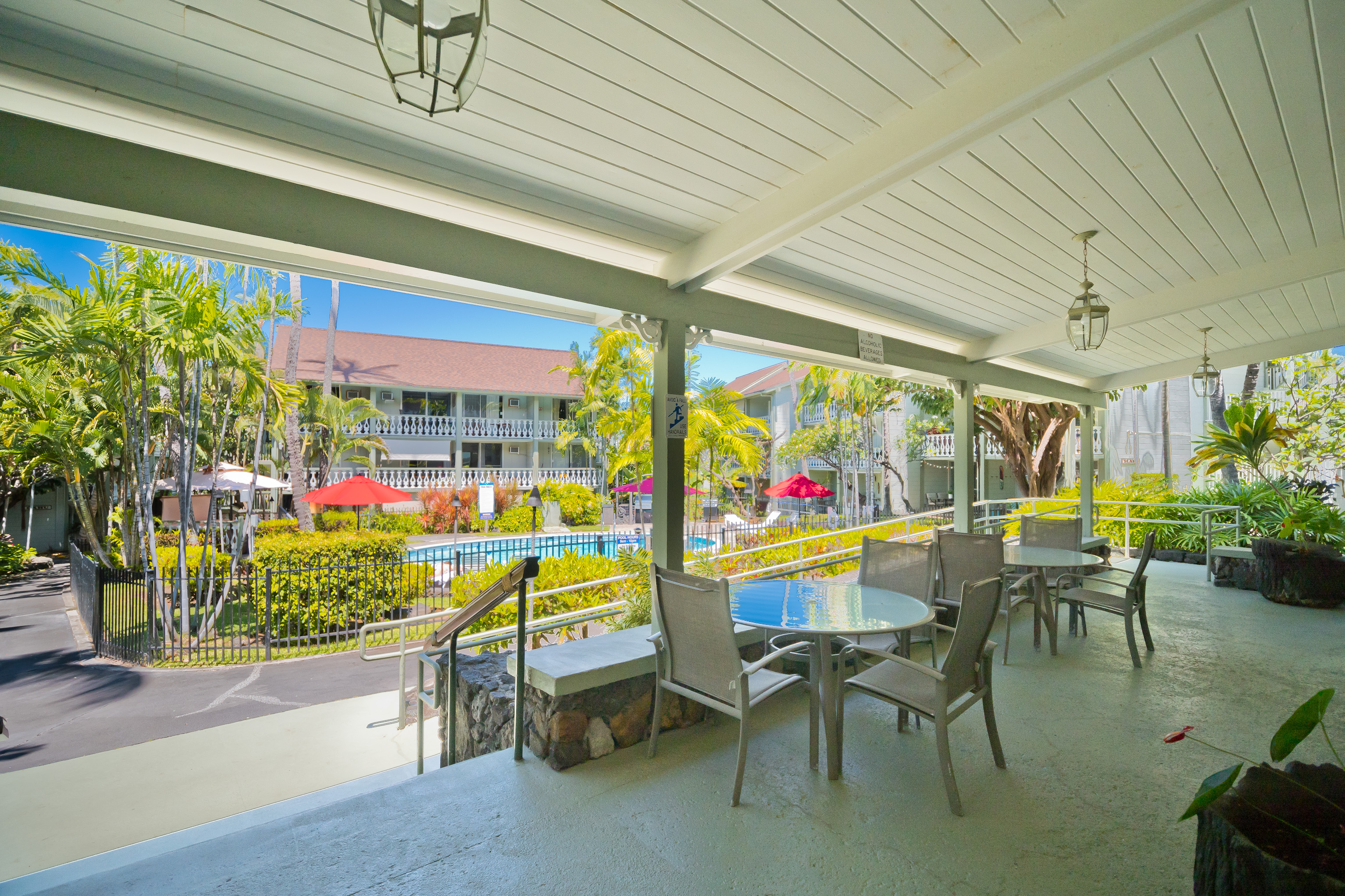 75-5776 Kuakini Highway, Unit 123 Kailua-Kona, HI 96740 - Photo 22 of 26 a view of a chairs in patio