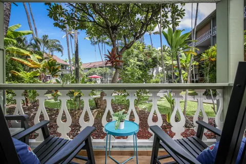 a view of a chairs and table on the deck