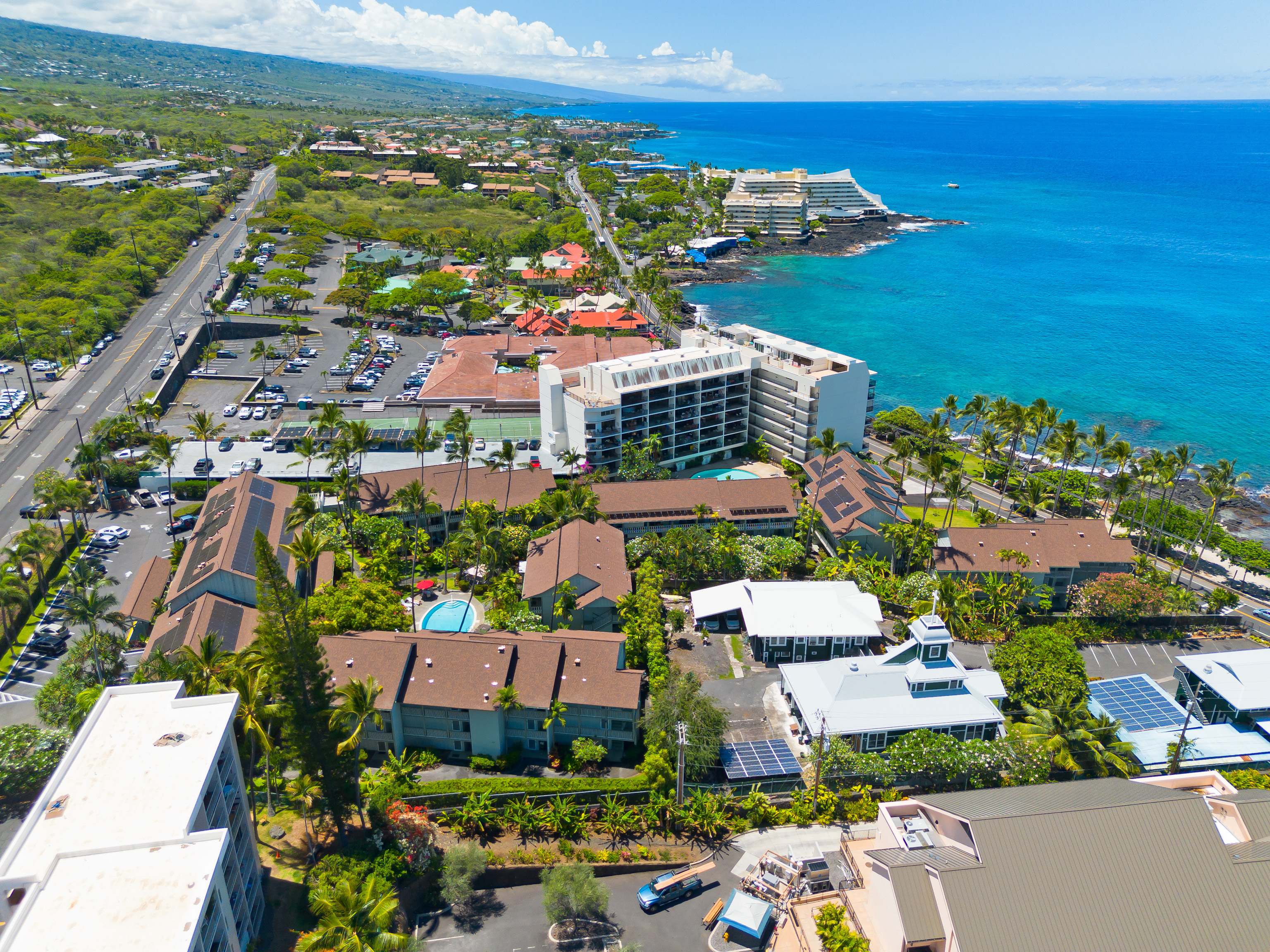 75-5776 Kuakini Highway, Unit 123 Kailua-Kona, HI 96740 - Photo 6 of 26 a view of a city with an ocean view