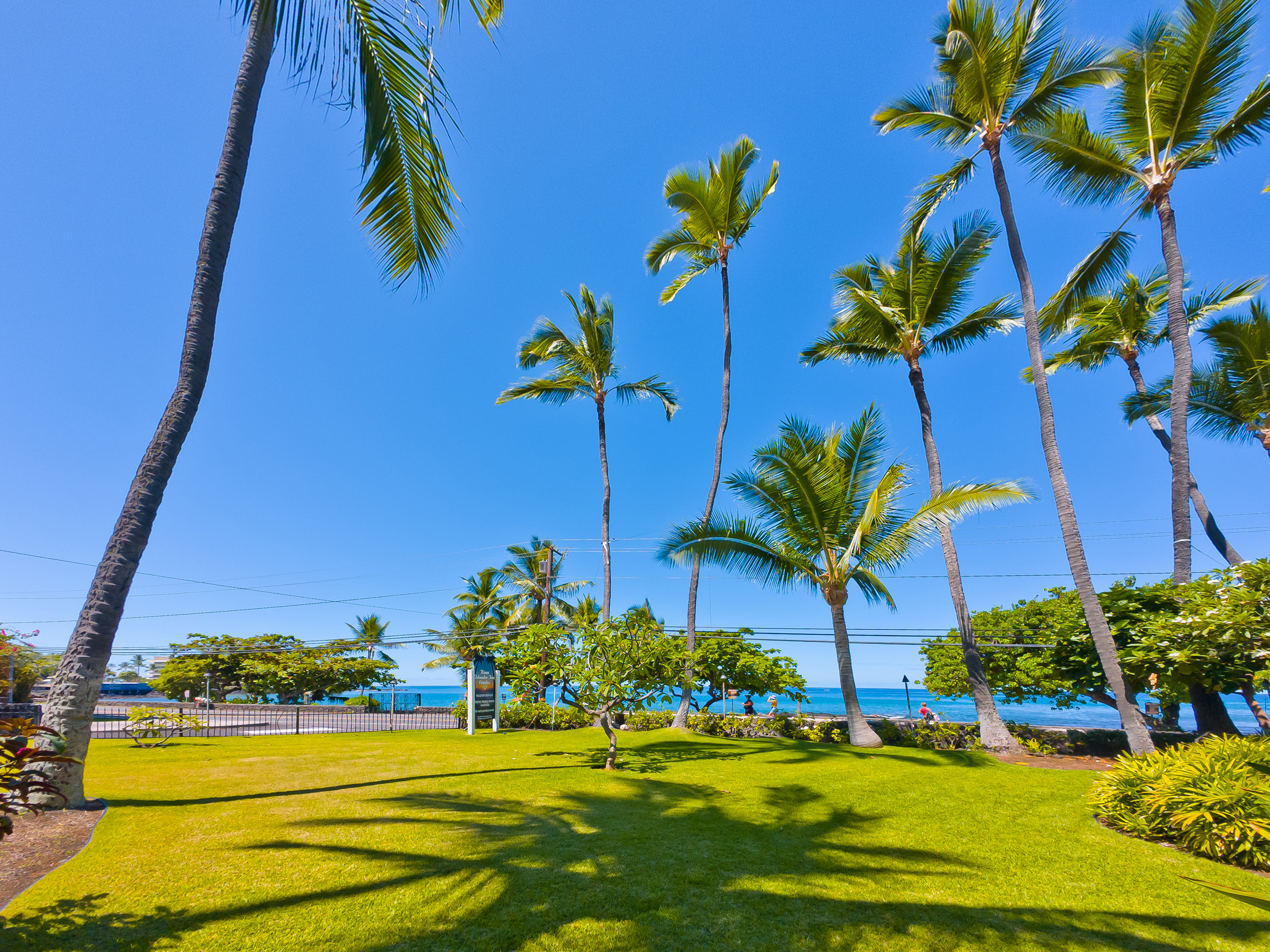 75-5776 Kuakini Highway, Unit 123 Kailua-Kona, HI 96740 - Photo 7 of 26 a view of swimming pool with a table and chairs