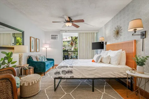 a bed room with furniture and a chandelier