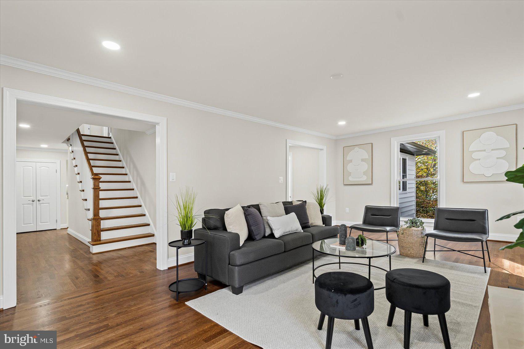 7604 Hackamore Drive Potomac, MD 20854 - Photo 12 of 81 a living room with furniture and a wooden floor