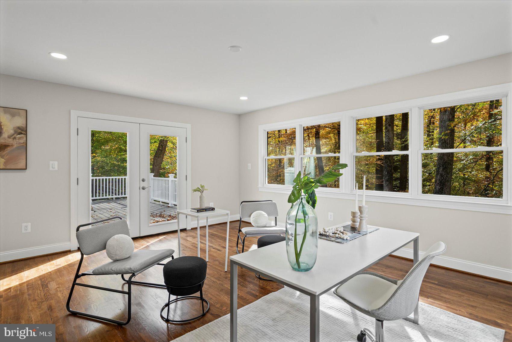 7604 Hackamore Drive Potomac, MD 20854 - Photo 22 of 81 a view of a dining room with furniture and windows