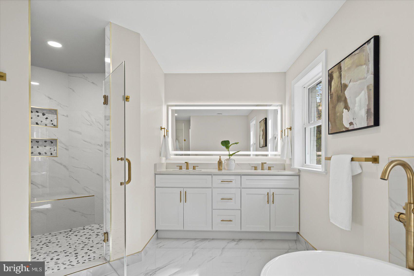 7604 Hackamore Drive Potomac, MD 20854 - Photo 70 of 81 a bathroom with a granite countertop sink toilet and shower