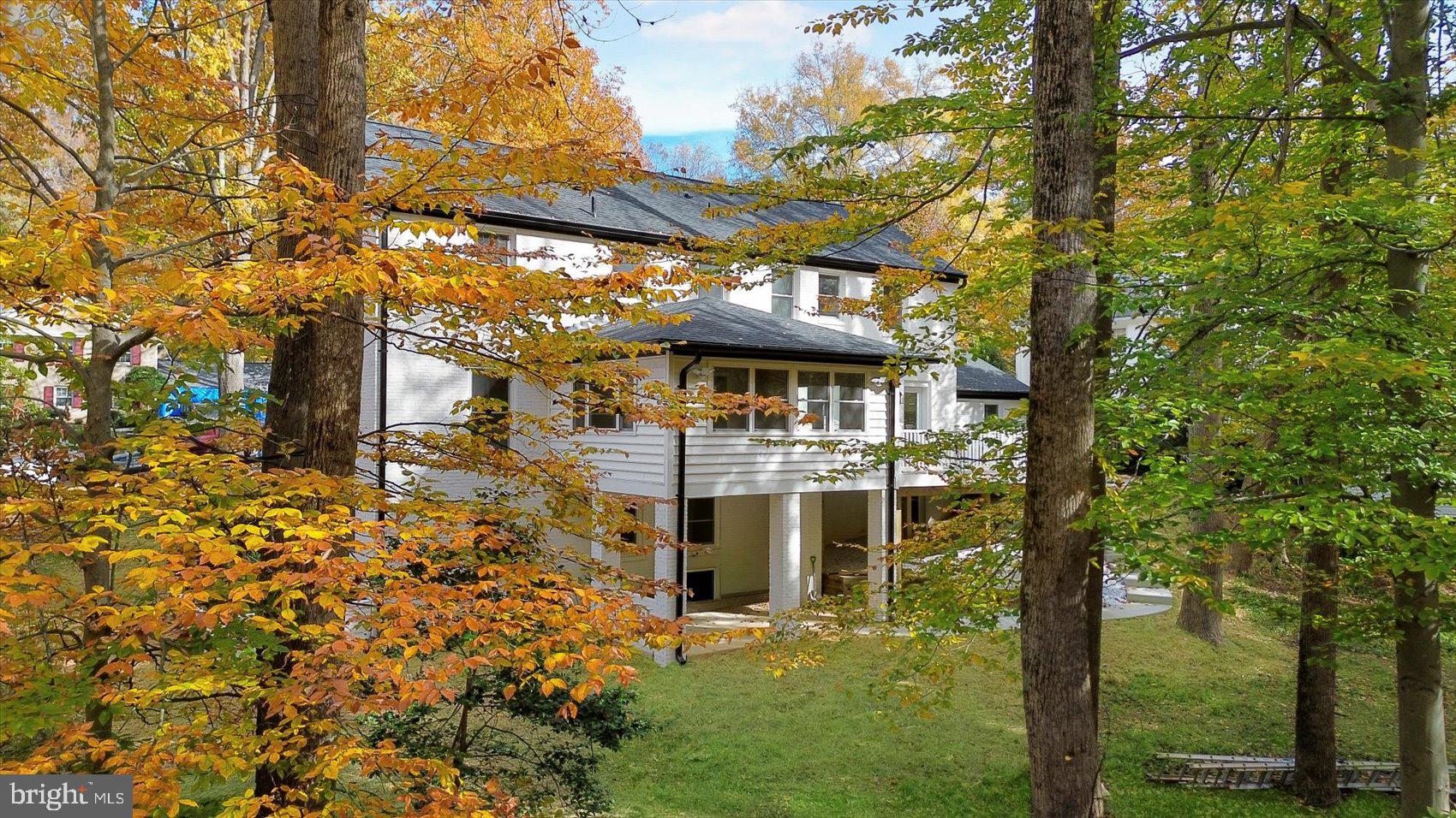 7604 Hackamore Drive Potomac, MD 20854 - Photo 7 of 81 a front view of a house with a yard