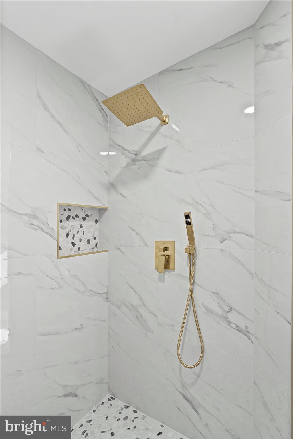 7604 Hackamore Drive Potomac, MD 20854 - Photo 72 of 81 a bathroom with a shower