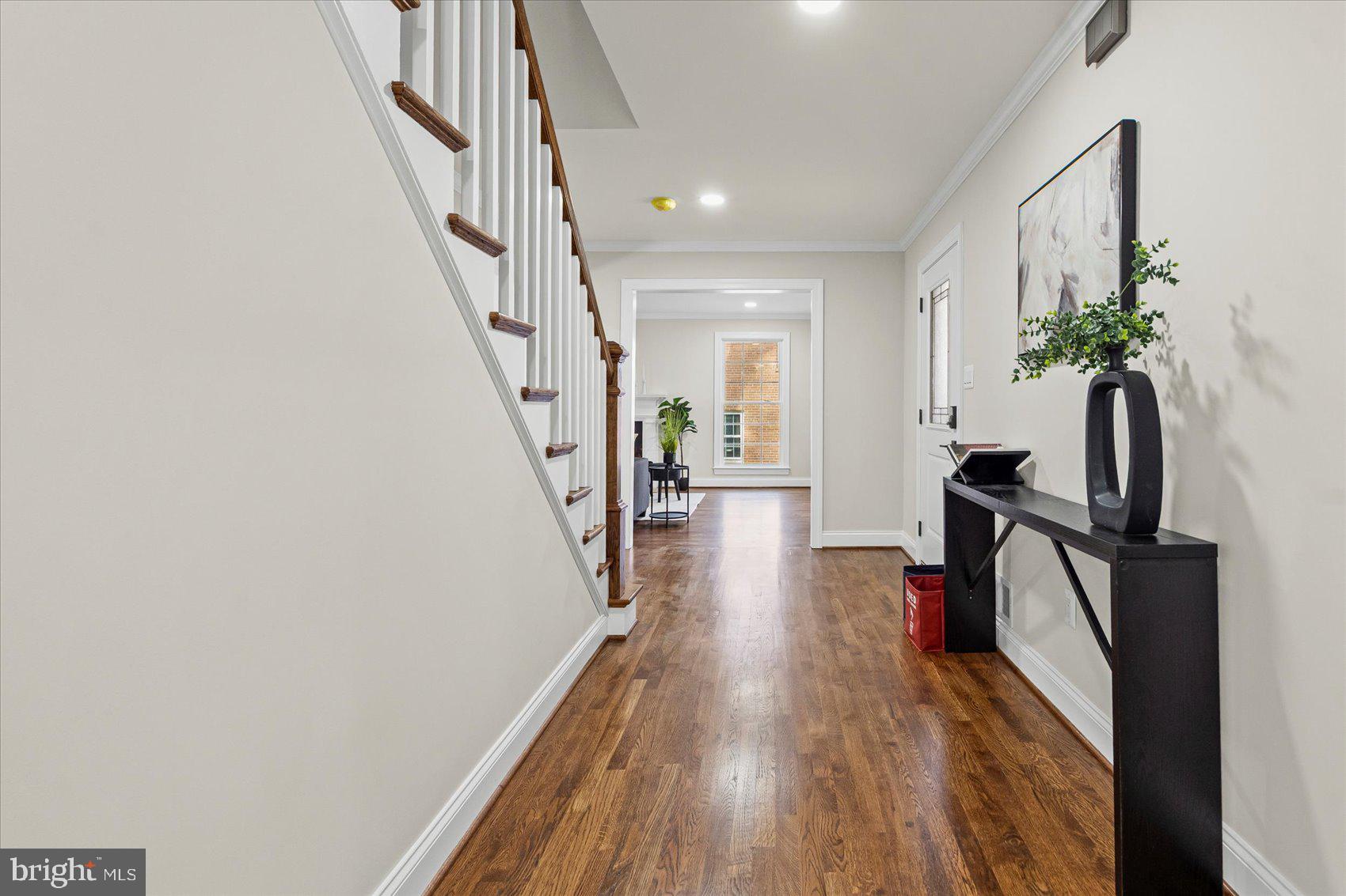 7604 Hackamore Drive Potomac, MD 20854 - Photo 10 of 81 a view of entryway with wooden floor and stairs