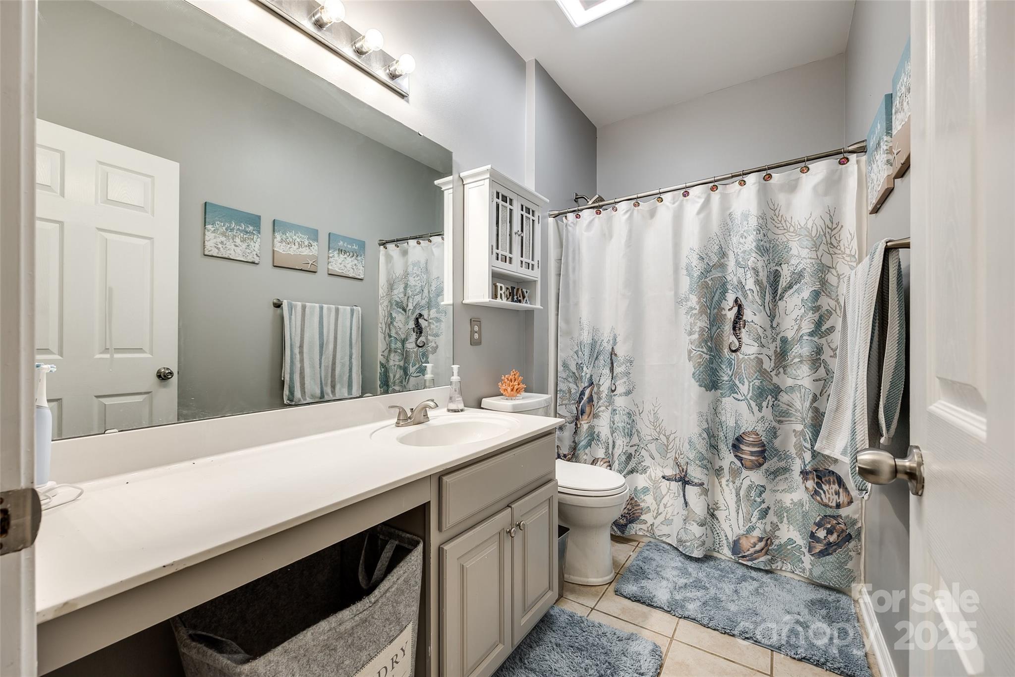 341 Fischer Road Fort Mill, SC 29715 - Photo 25 of 48 a bathroom with a double vanity sink toilet and shower