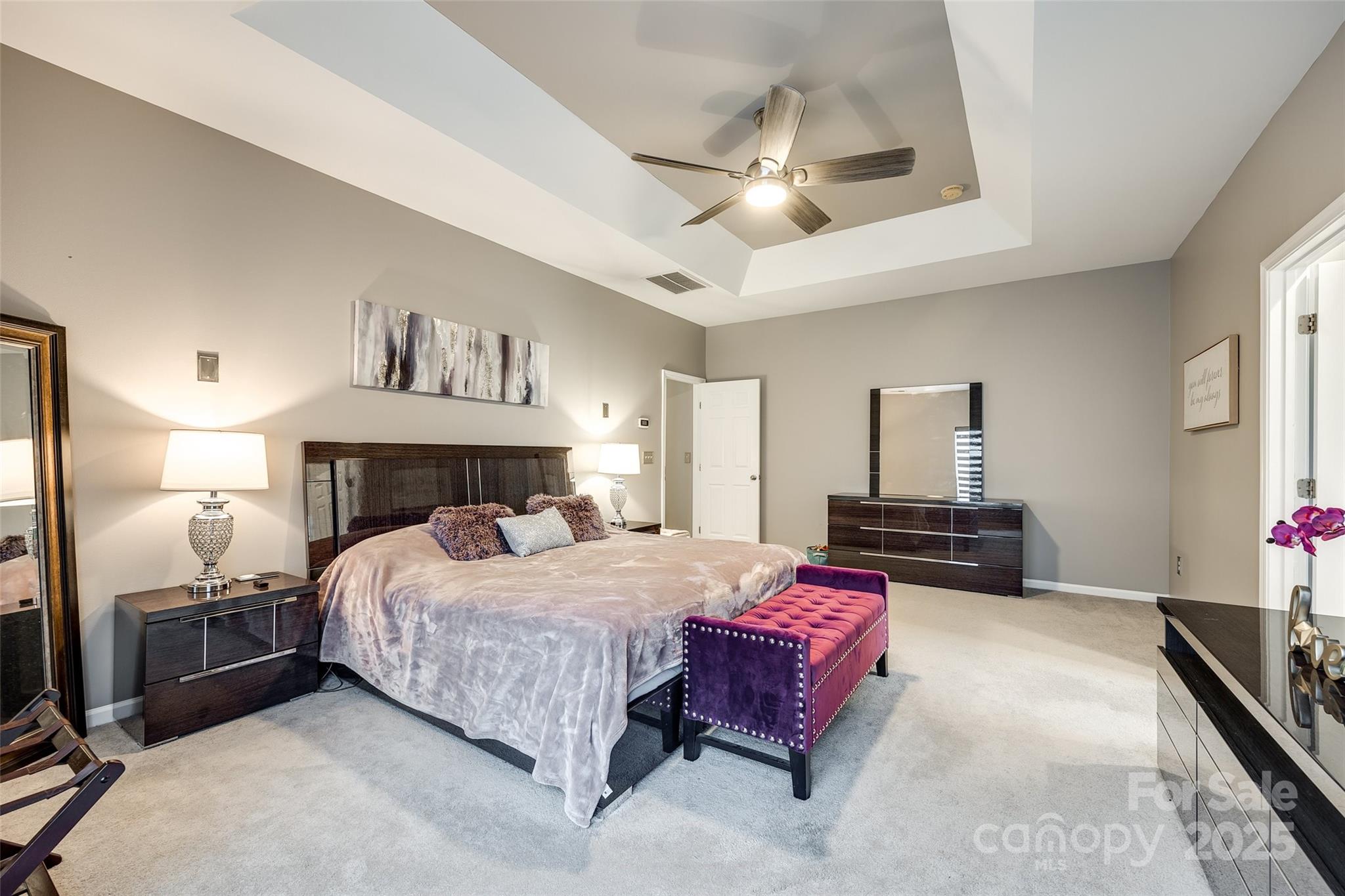 341 Fischer Road Fort Mill, SC 29715 - Photo 29 of 48 a bedroom with a bed and ceiling fan