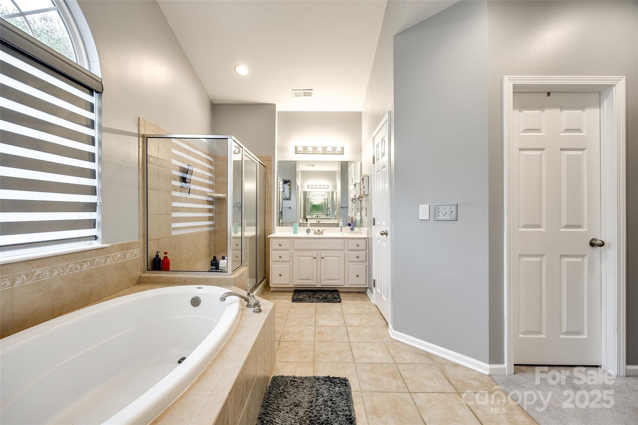 341 Fischer Road Fort Mill, SC 29715 - Photo 30 of 48 a bathroom with a tub shower and sink