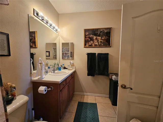 front view of a house with a garden