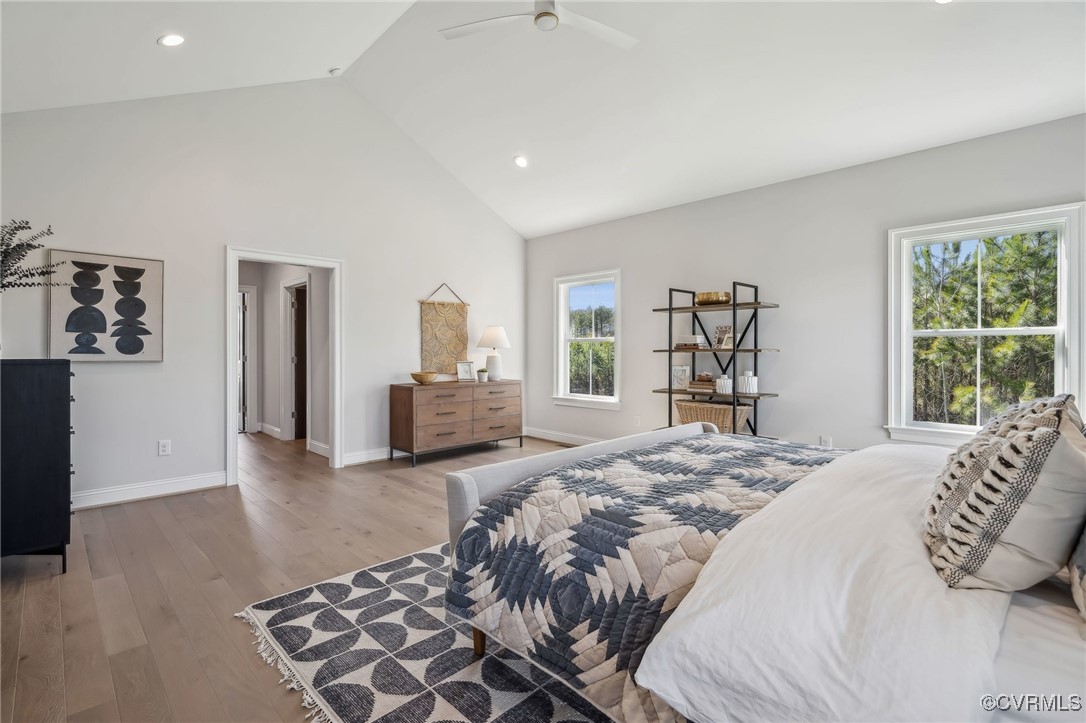 16873 Watchman Way Beaverdam, VA 23015 - Photo 17 of 40 a spacious bedroom with a large bed and a dresser