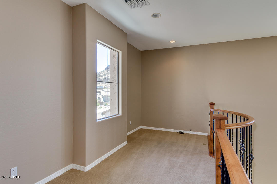 9121 West Plum Road Peoria, AZ 85383 - Photo 30 of 69 a view of hallway with stairs