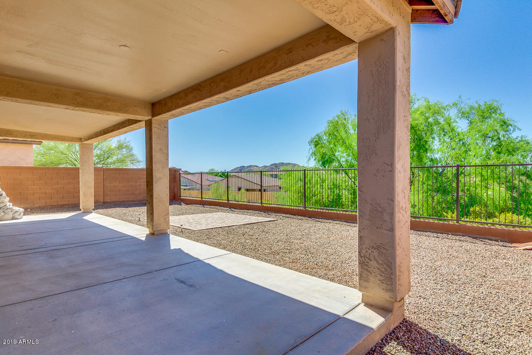 9121 West Plum Road Peoria, AZ 85383 - Photo 54 of 69 a view of a house with a street from a porch
