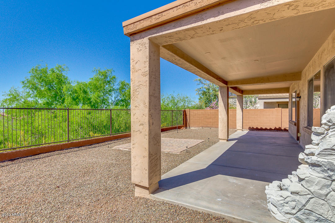 9121 West Plum Road Peoria, AZ 85383 - Photo 55 of 69 a view of backyard with green space