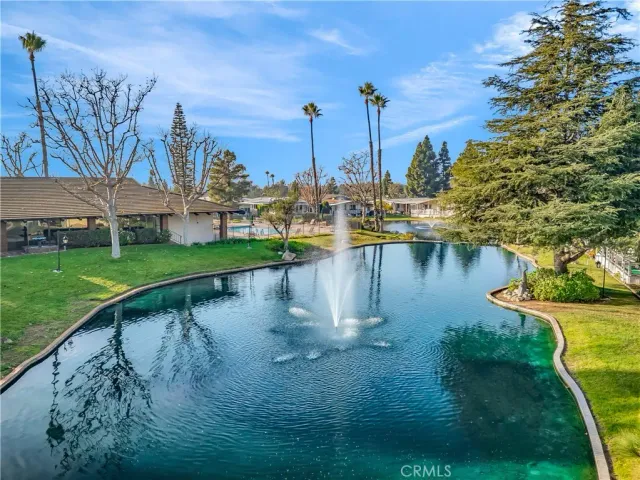 a view of a lake with houses with outdoor space