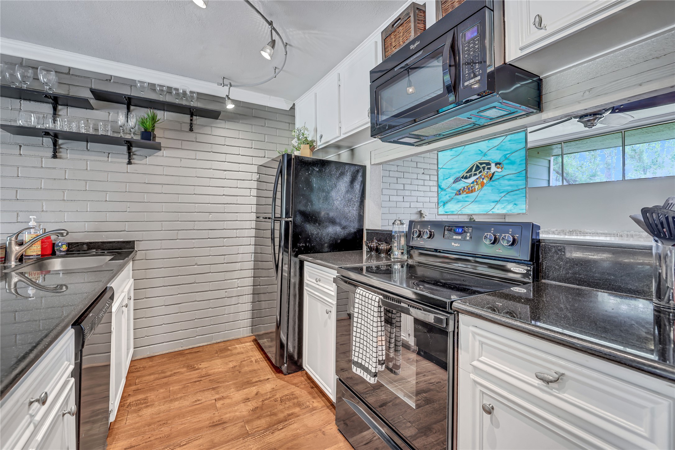 146 Villa Way Coldspring, TX 77331 - Photo 10 of 37 The kitchen has granite countertops