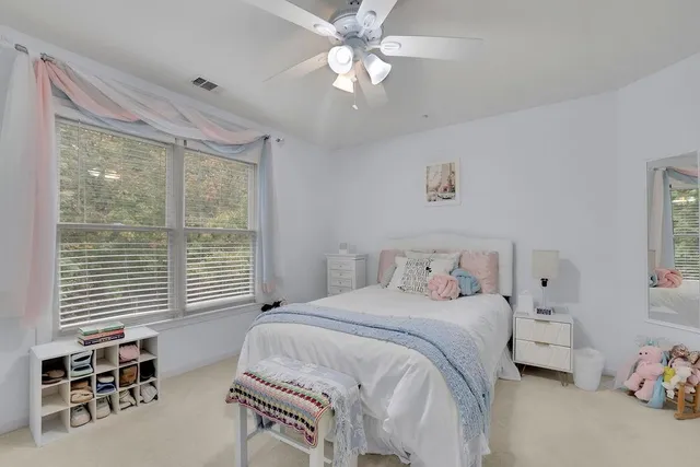 a bathroom with a bathtub a sink and a mirror