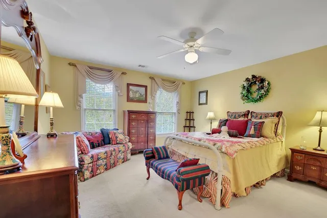 a large bathroom with a double vanity sink mirror and shower