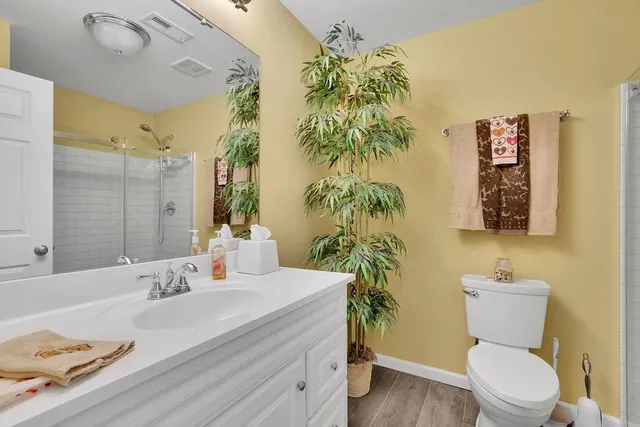 a view of a livingroom with furniture and a window